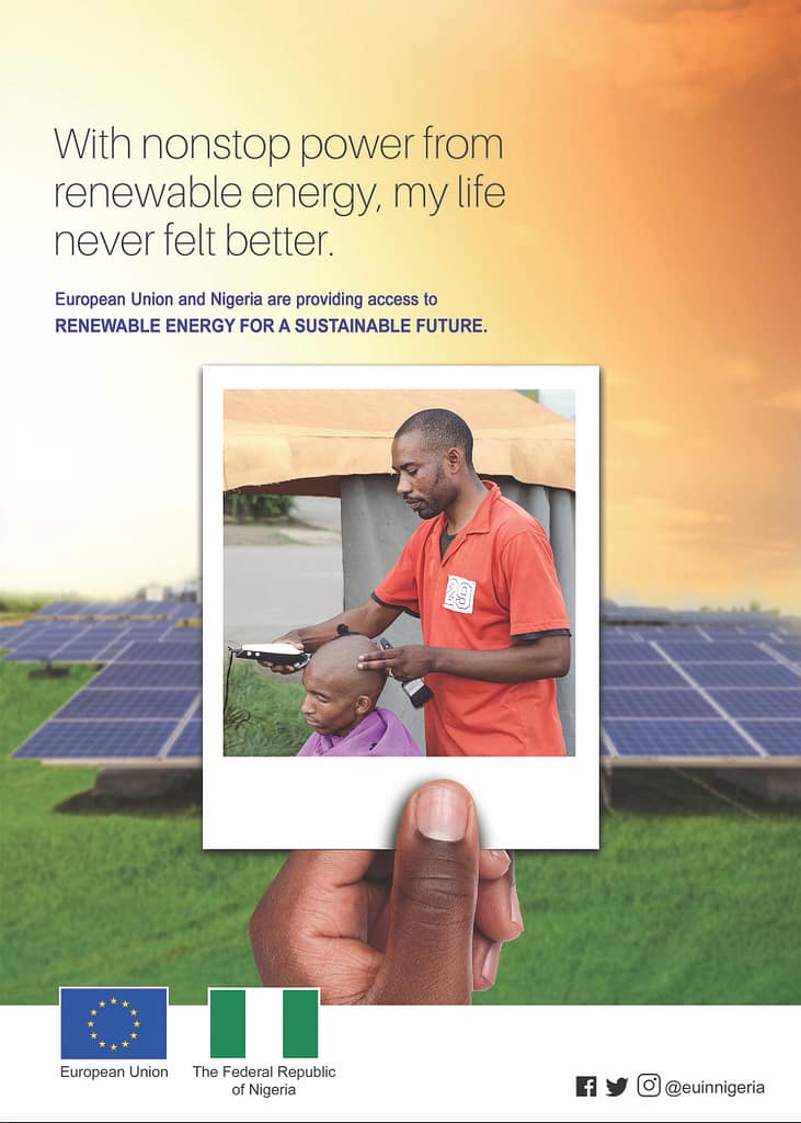 African barber shaving a man's head